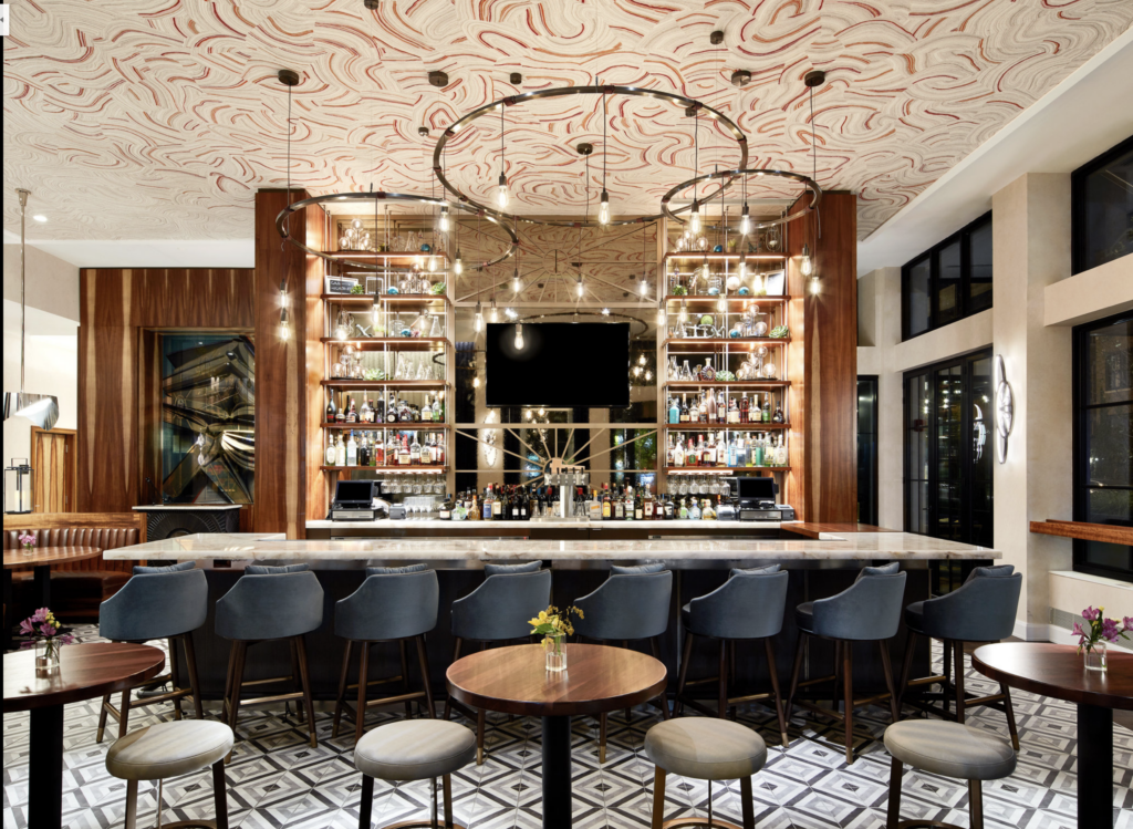 Modern bar interior with wood ceiling design and shelving